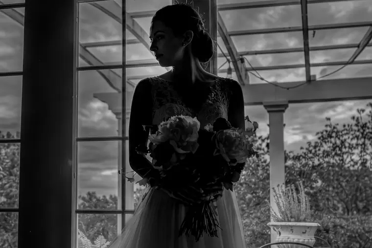 Silhouette at the window — HyperLens Studio wedding photography, Florida